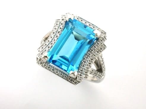 Annmarie Bespoke Gemstone Ring with designed with blue topaz & pave set diamonds as a truly unique engagement ring.