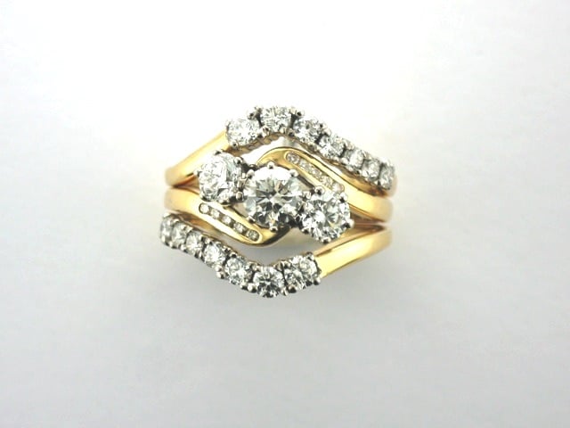 Elaine Bespoke Diamond Rings designed as Partner Rings for this Classic Engagement ring in 18ct gold by Pearl Perfect
