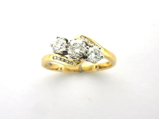 Elaine Bespoke Diamond Rings designed as Partner Rings for this Classic Engagement ring in 18ct gold by Pearl Perfect